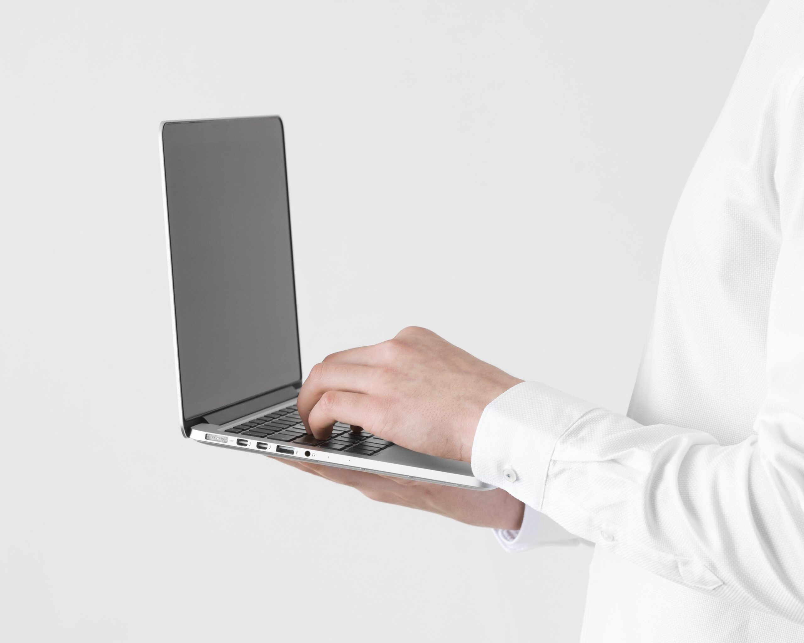 close-up-hands-typing-laptop